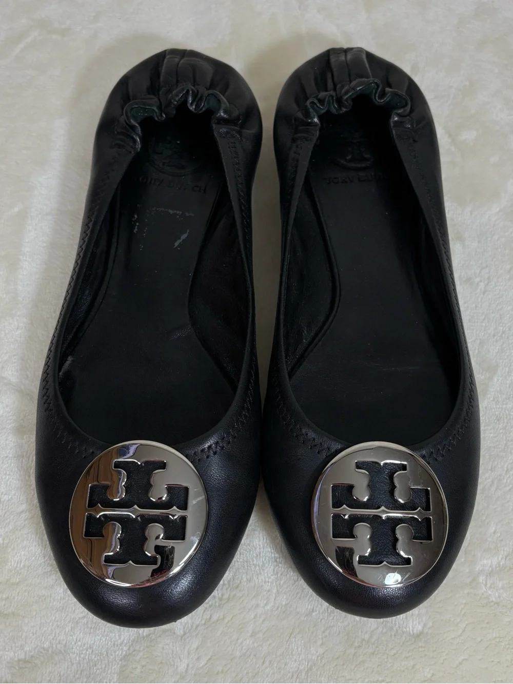 Tory Burch Reva black leather ballet flats Silver Logo Medallion Size 7